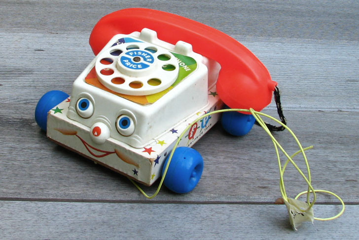 игрушечный дисковый телефон