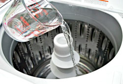 Как почистить стиральную машину с вертикальной загрузкой?